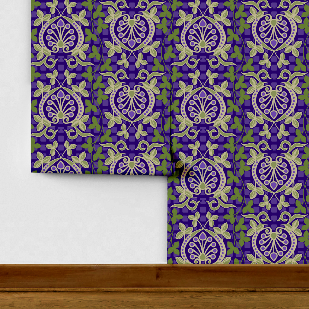 Pomegranate is a seamless repeating pattern featuring stylized heart-shaped floral motifs. Each motif has a central symmetrical design with curling tendrils and small circular shapes radiating from a rounded base. Surrounding these heart-shaped forms are pale green leaves and vines that interlock smoothly, creating an intricate lattice effect. The background is a deep blue, enriched by a subtle checkerboard texture that adds depth and contrast. The overall composition is balanced and harmonious, with elegant curves and a vintage aesthetic reminiscent of traditional textile designs. The dominant colors are dark blue, olive green, and muted beige, highlighting the natural and ornamental qualities of the pattern.